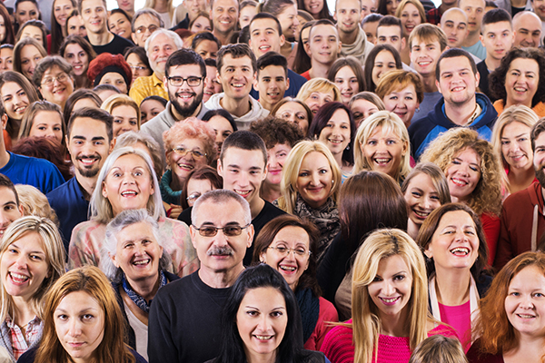 Group of happy people looking at camera.