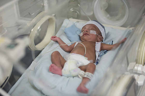 Beautiful newborn in the neonatal intensive care unit sleeping