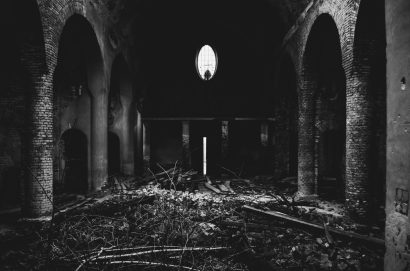 Ruins of the old church near Lviv, Ukraine. Concept of chaos, evil, and destruction. Black and white